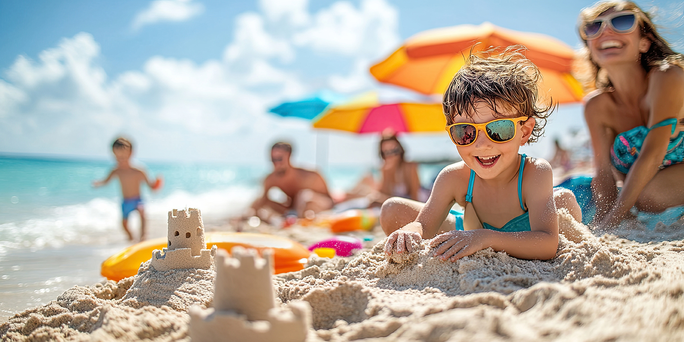 55. A relaxing family beach day with parents and children playin